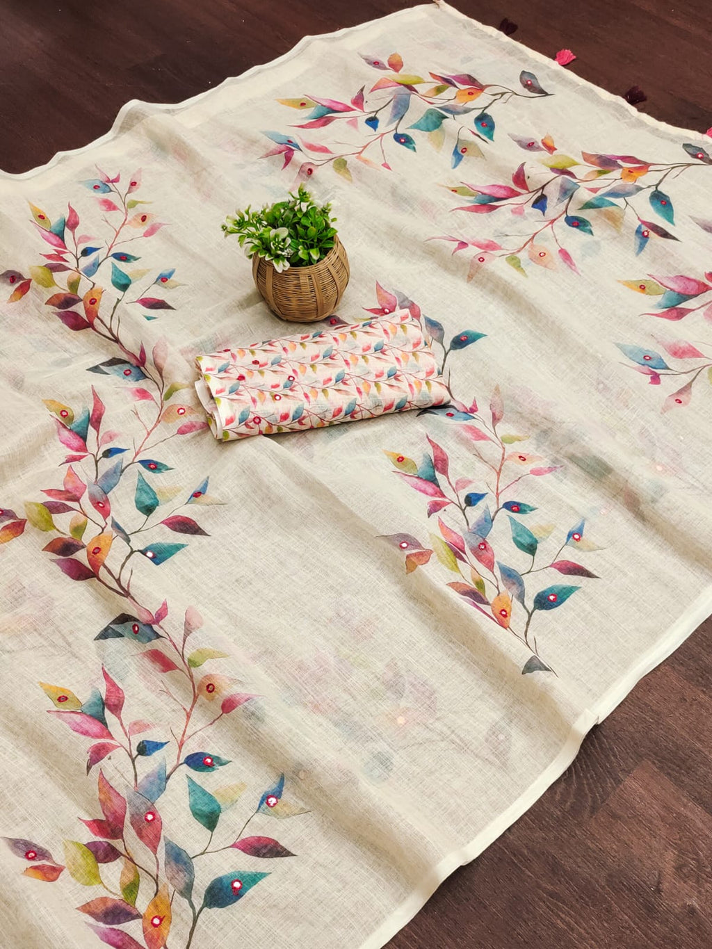 Off-White Linen Cotton Saree featuring Vibrant Watercolor Digital Leaf Prints and Mirror Accents